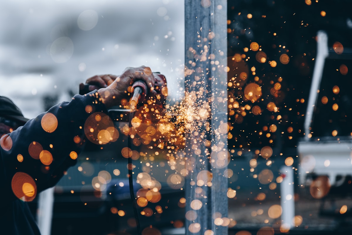 Steel grinding with dramatic welding sparks